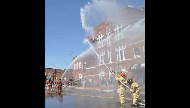 Water application drill at the Iowa Firefighters Association Convention in Manchester on Sept. 11.